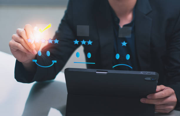 istock Businessman customer use tabet computer,review experience service satisfaction evaluation feedback,via modern application technology,user give rating survey service experience online concept 1408175755