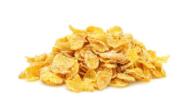 cornflakes isoliert auf weiß - cornflakes stock-fotos und bilder