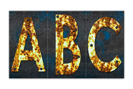 Letter A.B.C. Alphabet from letters, from rusty iron, on a wooden plank. Isolated on white background. Education. Design element.