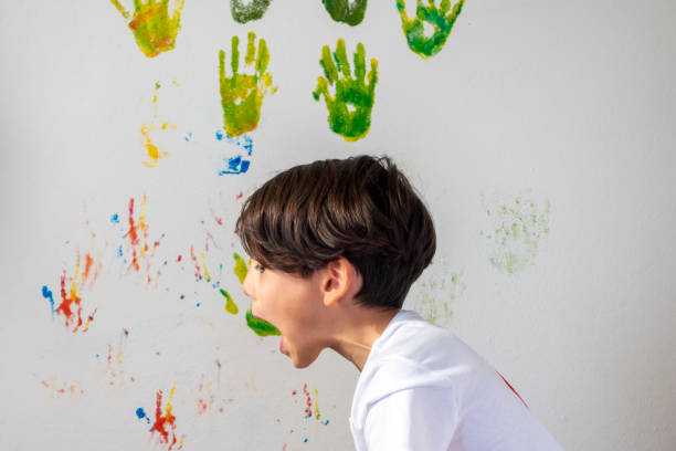 Child's Drawings on a Green Chalkboard