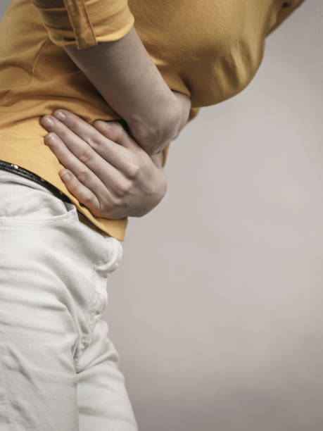 istock Woman suffer from belly pain. 1408183553