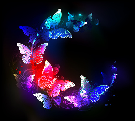 Fluttering in circle, luminous, bright, neon night butterflies on black, luminescent background. Night butterflies.