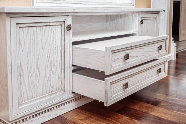 Built-in chest of drawers from solid ash in light enamel