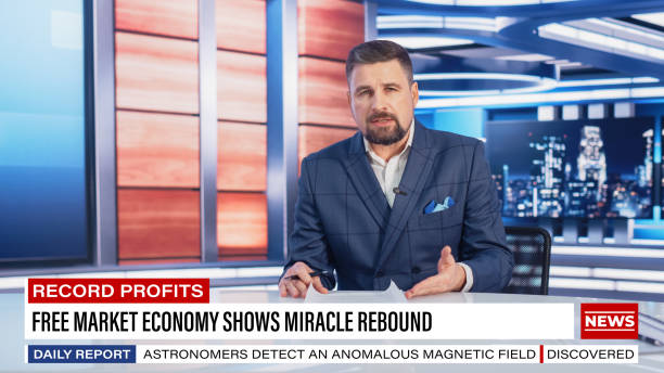 istock Beginning Evening News TV Program: Anchor Presenter Reporting on Business, Economy, Science, Politics. Television Cable Channel Anchorman Talks. Broadcast Network Newsroom Studio Concept. 1408188926