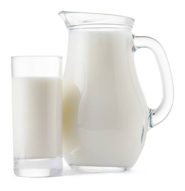 istock Glass jar and cup of fresh milk isolated 1408190763