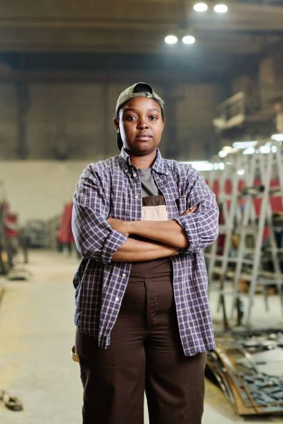 istock African female worker at factory 1408190969