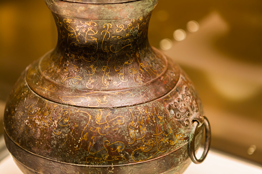Home decoration, Partial close-up of imitation bronze, patina, texture, jar, bottle