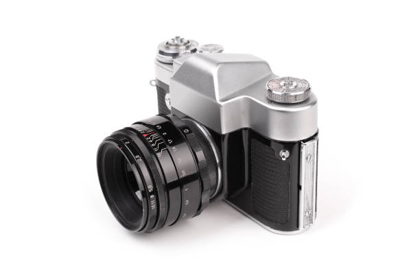 istock Vintage SLR camera isolated on white background. 1408195251