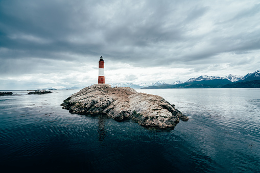 Les Eclaireurs Lighthouse near Ushuaia in Patagonia. Overcast sky in the background.