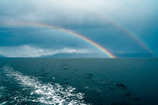 Double rainbow in Beagle Channel on a cloudy day. View from a boat on the way to Ushuaia.