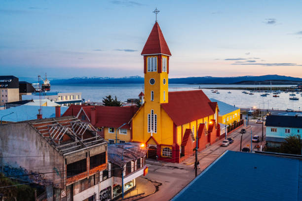 Ushuaia's church at sunset Ushuaia's church at sunset. Elevated point of view. Patagonia, Argentina. Salesian Church. tierra del fuego national territory stock pictures, royalty-free photos & images