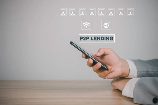 Peer to peer landing concept, users communicate landing agreements through mobile screens. Peer to peer landing concept, users communicate landing agreements through mobile screens. contributor stock pictures, royalty-free photos & images