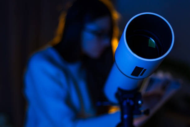 Astronomer woman setting telescope Silhouette of astronomer woman setting telescope at night sky, space, cosmos, universe, Milky way. Young female scientist watching stars, observing stars and Moon at moonlight. Do astronomy work. meteor shower stock pictures, royalty-free photos & images