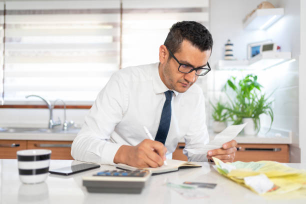 istock Calculating Financial Budget 1408206422