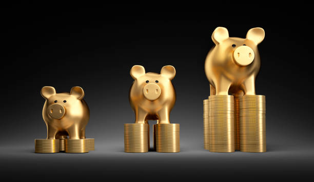 istock Piggy banks on stack of coins 1408208288