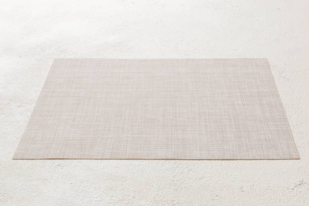 istock Perspective view of brown tablecloth for food on cement background. Empty space for your design 1408210788