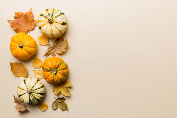istock Autumn composition. Pattern made of dried leaves and other design accessories on table. Flat lay, top view 1408210811