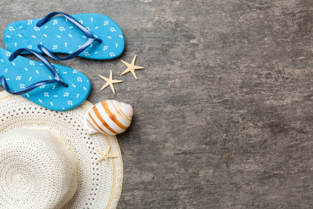 istock Summer vacation concept flat lay. straw hat beach accessories and towel top view. Space for text. travel concept 1408210839