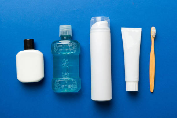 istock Mockup for bathing products top view flat lay, spa razor, toothpaste, soap, gel and other various accessories. Cosmetics for skin health. Bath Mockup for your logo 1408210887