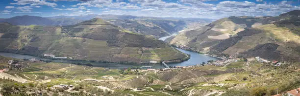 Panoramic image looking down to the river Douro and Pinhão - winegrowing area of the Douro in Portugal. Stitch from several single images.