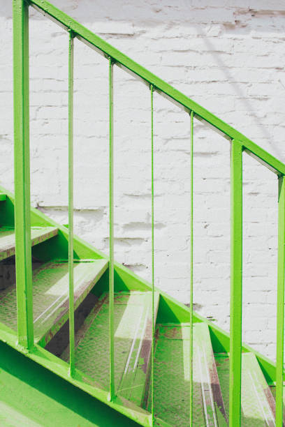 istock Green metal stairs. 1408217453