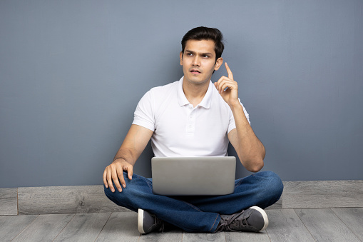 Handsome man using laptop,