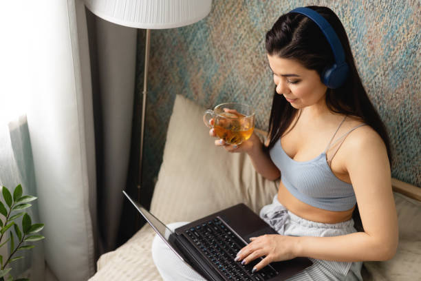 istock A girl studies or works remotely at home and home office 1408225507
