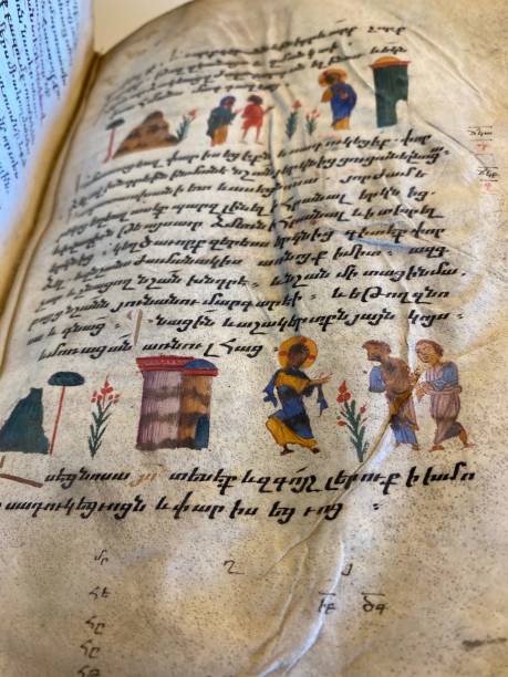 лист армянской библии 15-го века, на пергаменте, иллюминированная рукопись - vellum close up printed media condition стоковые фото и изображения