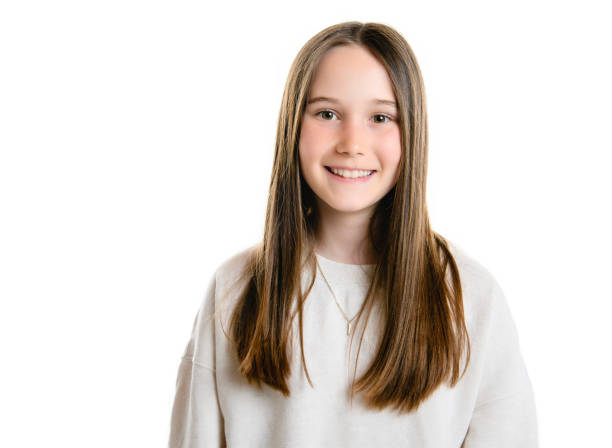 istock Young brunette pre teen girl on studio white 1408226355