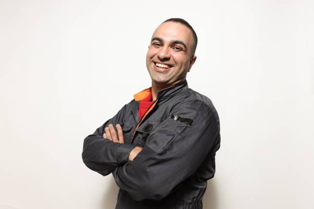 Portraits of Middle Eastern man looking at camera shot in a studio with white background.  Capture warm, confident, and authentic people imagery.