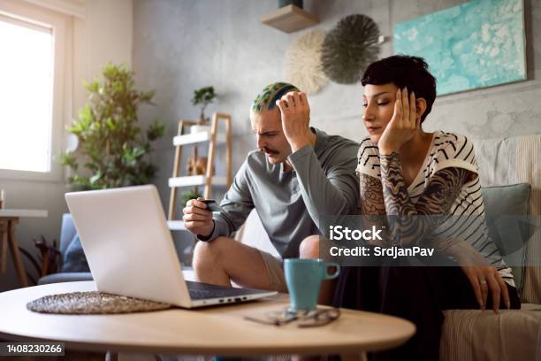 During Economic Inflation Worried Couple Trying To Resolve Their Financial Problems Stock Photo - Download Image Now