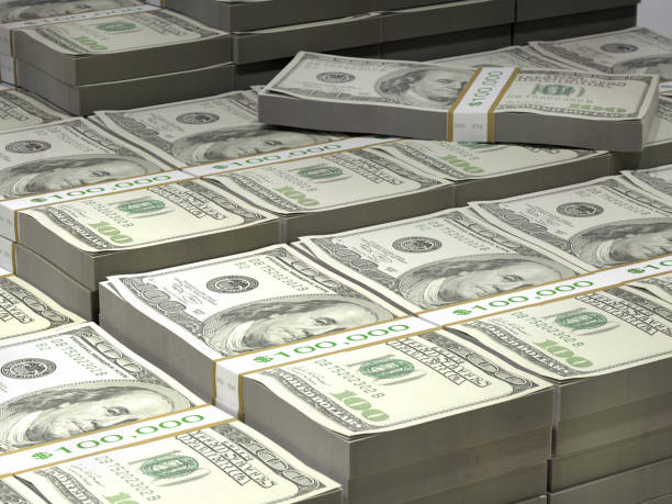 istock Pile of 100 dollar bill wads 1408233337