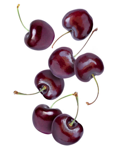 istock cherry flying in the air isolated on white 1408237363
