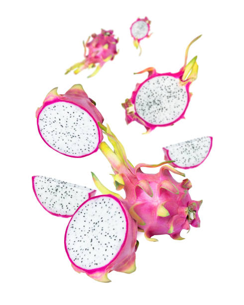 istock Dragon fruit (pitaya pitahaya) with cut half slice flying in the air isolated on white background 1408237424