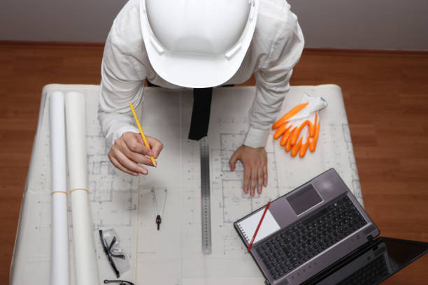 istock A civil engineer gives information about the project. 1408238223