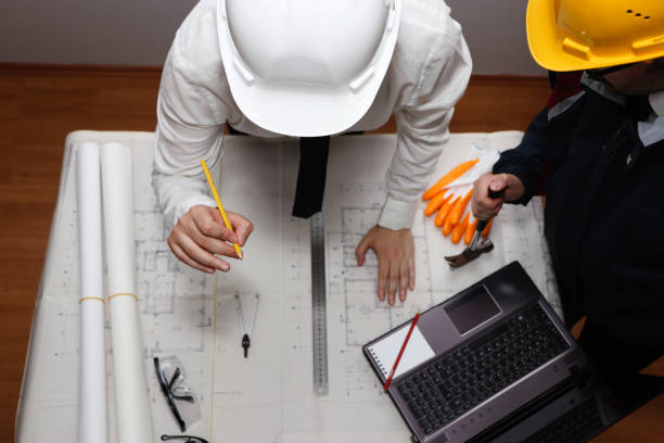 istock A civil engineer gives information about the project. 1408239237