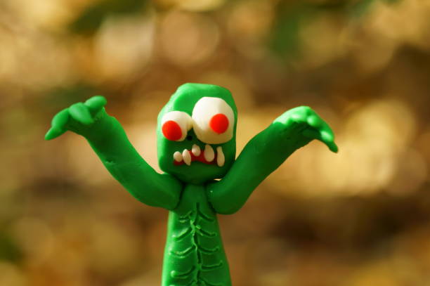 istock The zombie figurine is trying to scare. 1408240957