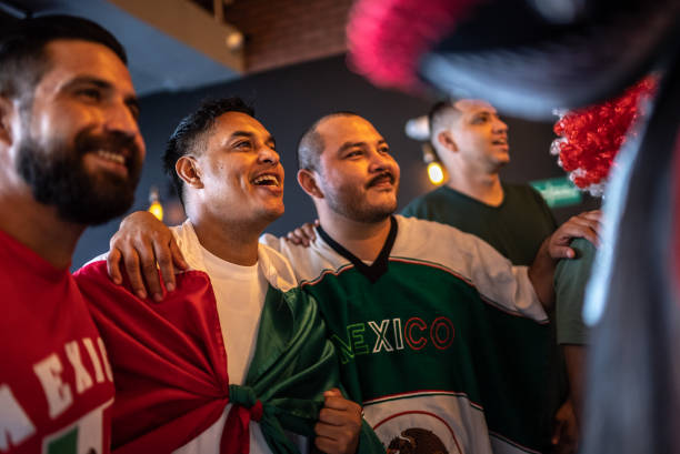 istock Mexican fans watching a soccer game at bar 1408241334