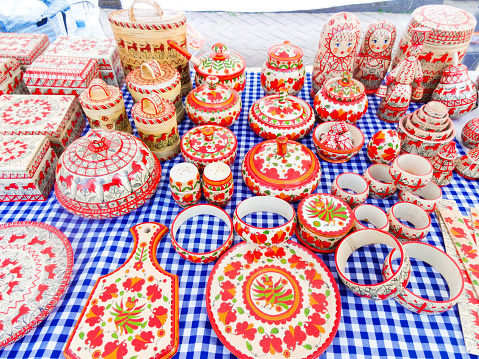 Russian folk crafts - traditional wood products with painting - cutting boards, caskets, toys