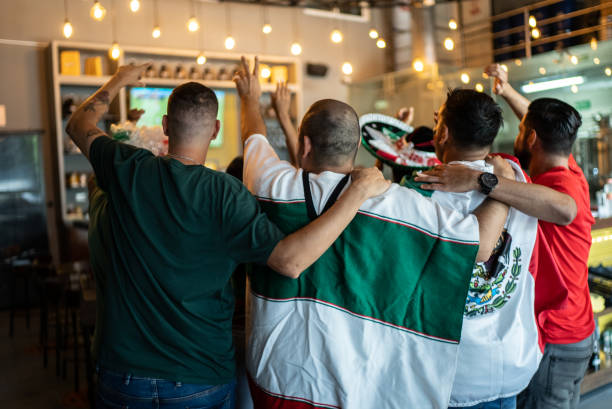 istock Mexican fans celebrating a goal in soccer game at bar 1408242586