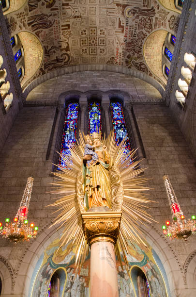 istock Statue of Mary holding Jesus 1408243277