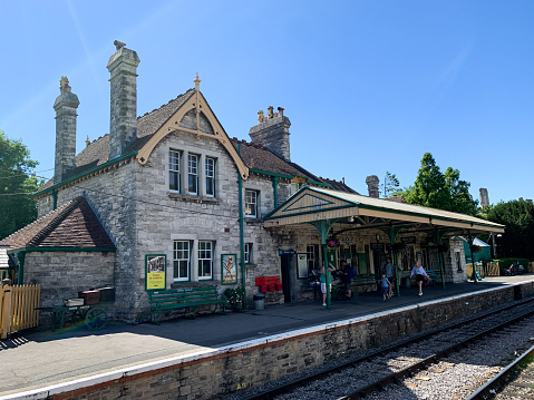 Port Erin, Isle of Man - 27 March 2023: carriages of the narrow-gauge steam railroad at the station in Port Erin