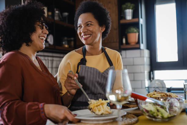 istock Gay couple having cozy dinner 1408249049