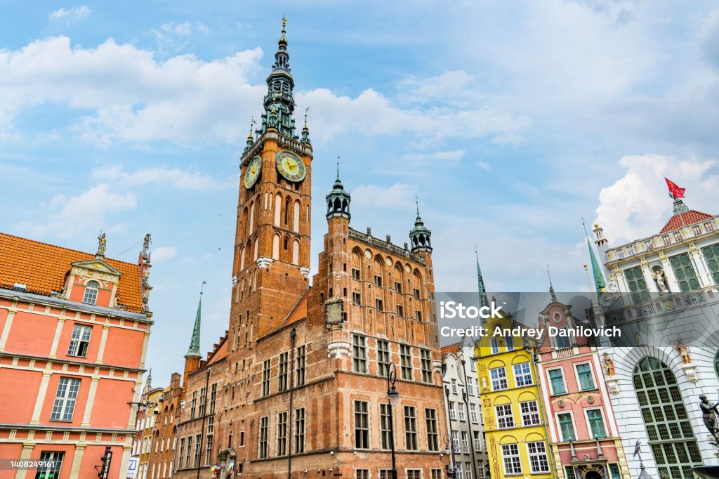 The centre of Gdansk old town. Old buildings facades in old town of Gdansk (Srodmiescie historic district). Blue sky is on the background. Architecture Stock Photo