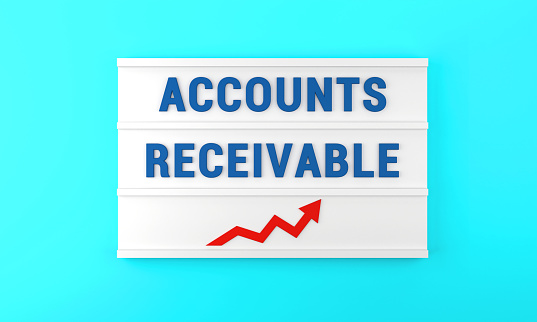 Success arrow and Accounts Receivable text on the lightbox, on the blue background. Finance and Economy concept.