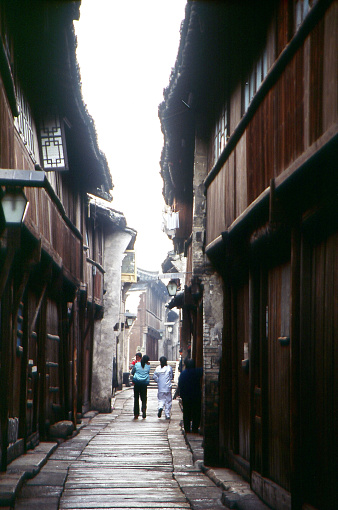 Ancient canal town Wuzhen in winter.  Wuzhen old town is located in northern Zhejiang province, near Shanghai. Photographic slide photo in Jan 24, 2004, Tongxiang County, Zhejiang