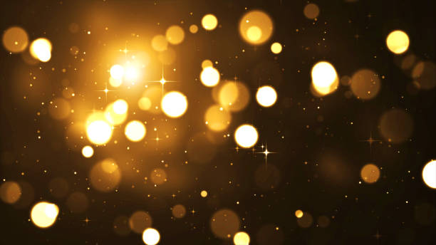 istock Abstract Orange Glittering Bokeh and Stars Background 1408255397