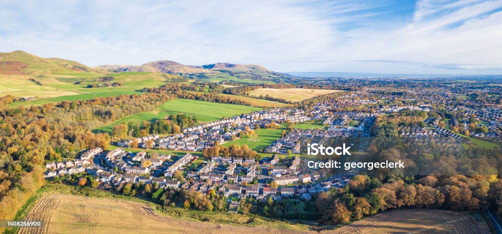 Panoramic view over the town of Penicuik, Scotland A panoramic aerial view of the town of Penicuik in Midlothian., located a few miles south of Edinburgh, with the Pentland Hills on the horizon. Midlothian - Scotland Stock Photo