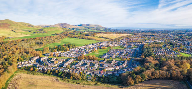 Panoramic view over the town of Penicuik, Scotland A panoramic aerial view of the town of Penicuik in Midlothian., located a few miles south of Edinburgh, with the Pentland Hills on the horizon. midlothian scotland stock pictures, royalty-free photos & images