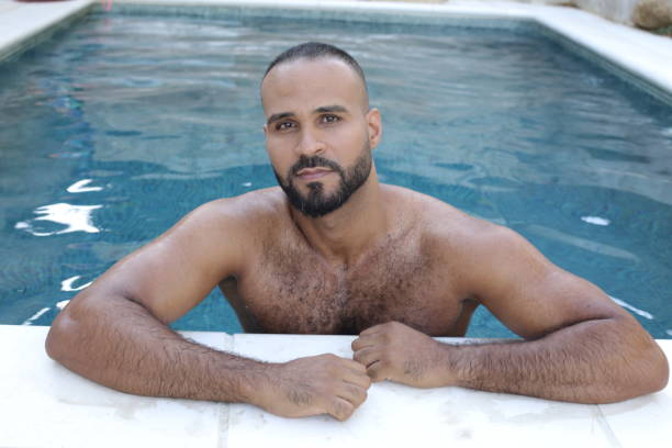 istock Cute man in swimming pool 1408258077